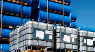 large colloidal silica containers outdoor on a sunny day, waiting for transportation to customer